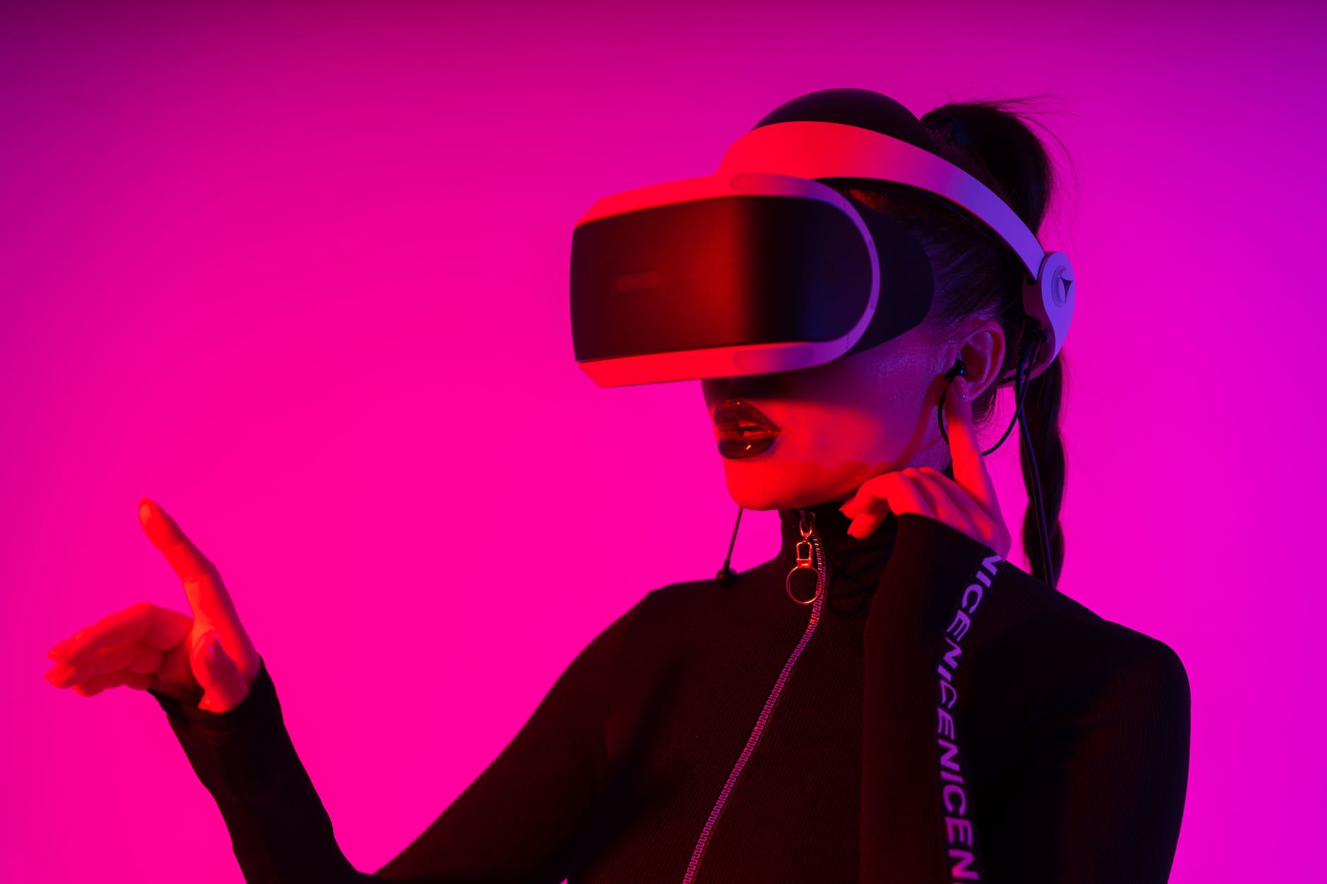 woman in vr helmet exploring virtual reality